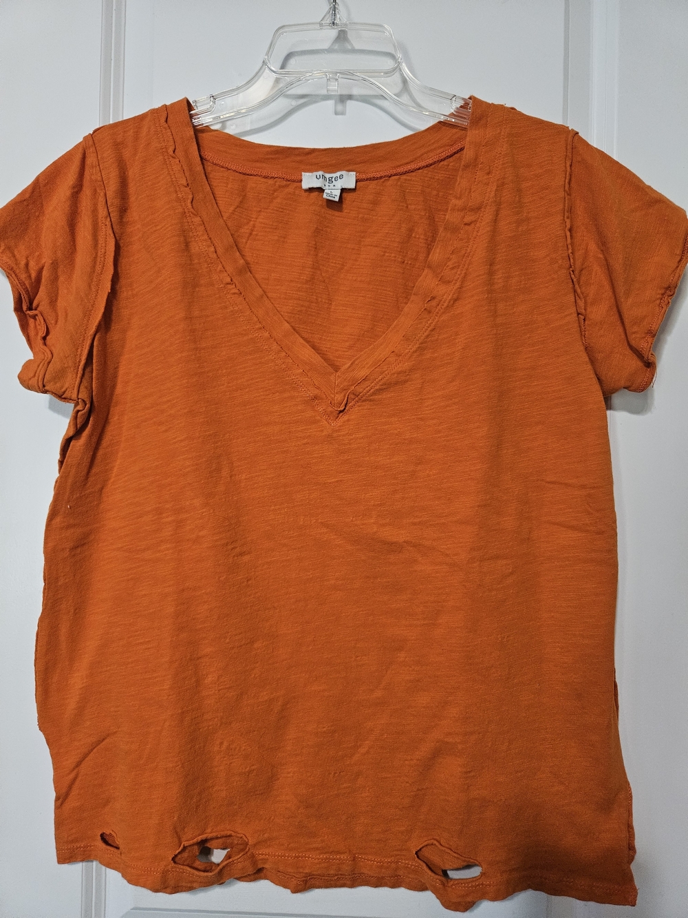 Umgee Orange V-Neck Short Sleeve Tee with Distressed Hem